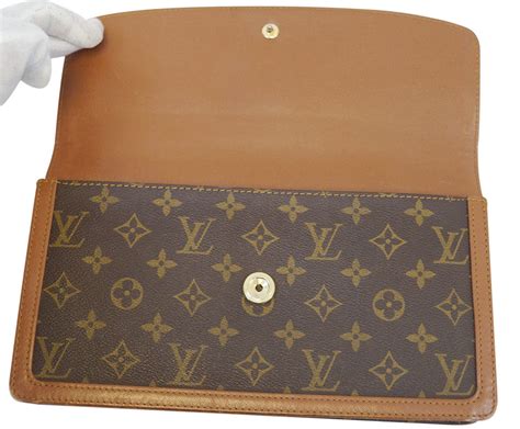 pochette clutch louis vuitton|louis vuitton monogram clutch.